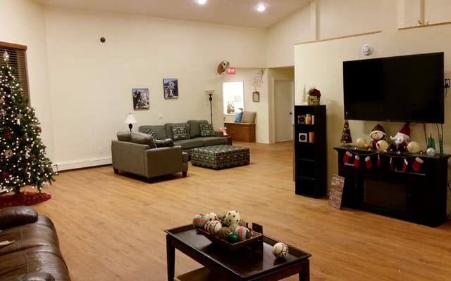 Bright and spacious common area with festive decorations