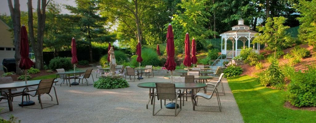 Serene outdoor patio area with gazebo and seating