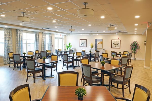 Bright and inviting dining room with tables and chairs