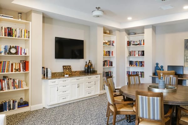 Interior of a common area with bookshelves and seating