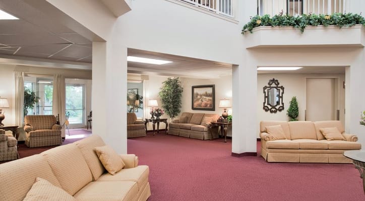 Bright common area with seating and plants