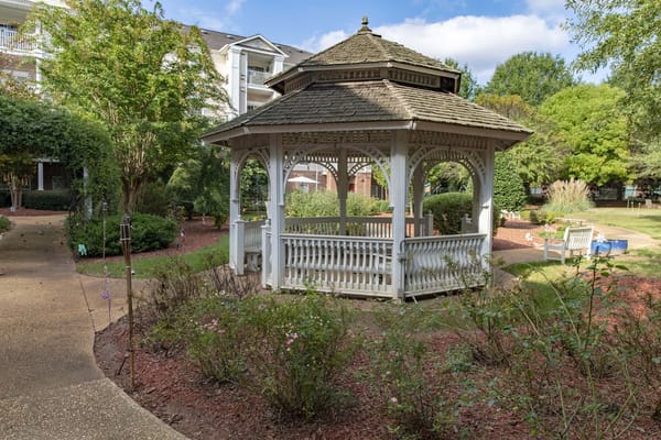Beautiful gazebo in a landscaped garden at the facility