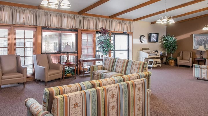 Cozy lounge area with comfortable seating and natural light.