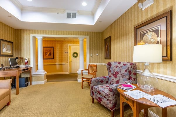 A cozy common area with seating and decor