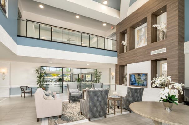 Bright and spacious lobby with seating and decor at Manor Village at Desert Ridge