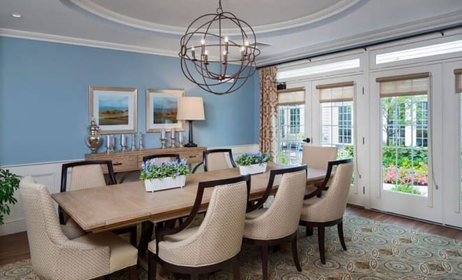Stylish dining room with a large table and seating