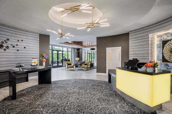 Bright lobby area with modern design and seating