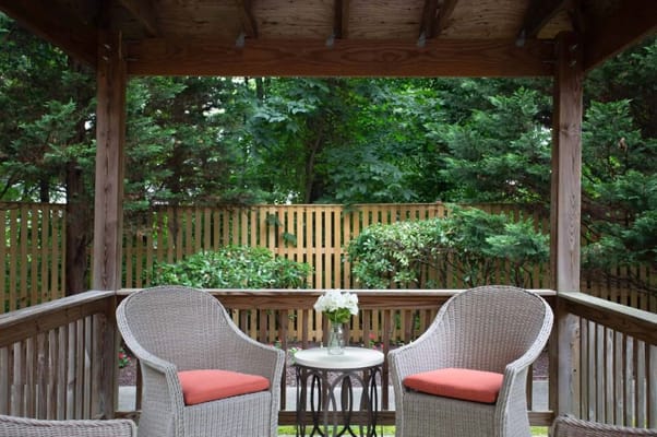 Outdoor seating area with chairs and a table