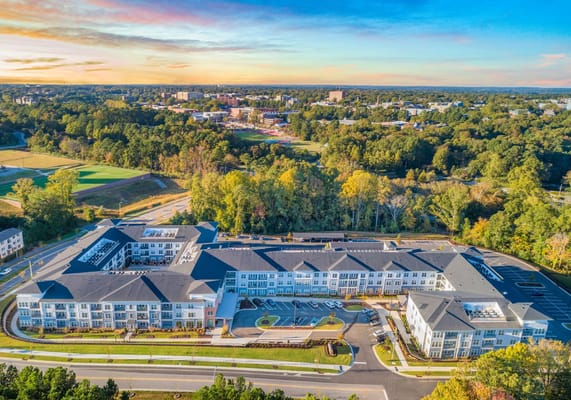 Aerial view of the senior living facility with surrounding nature