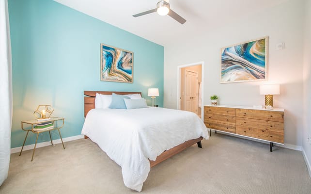 Bright, well-decorated bedroom in assisted living facility