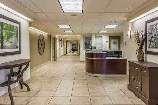 Bright, well-decorated facility interior hallway