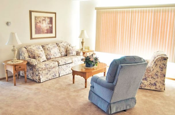 Cozy living room area with floral furniture