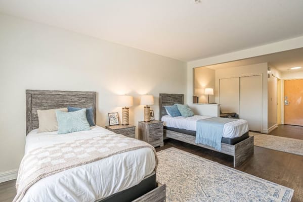 Bright, spacious shared bedroom in assisted living facility
