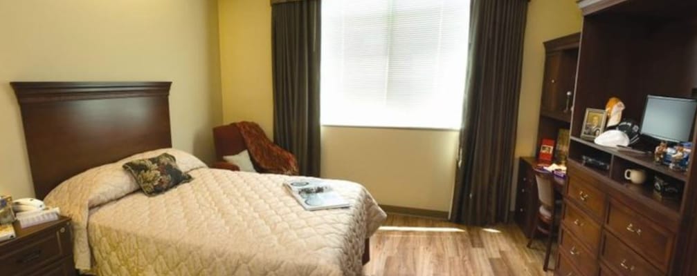 Cozy private room with a bed and desk