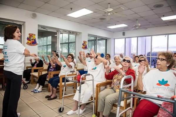 Residents participating in a group activity in a common area