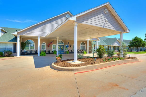 Front view of Silver Elm Estates entrance with landscaped area.