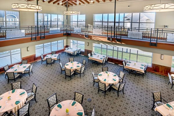 Interior view of a dining area with tables and chairs