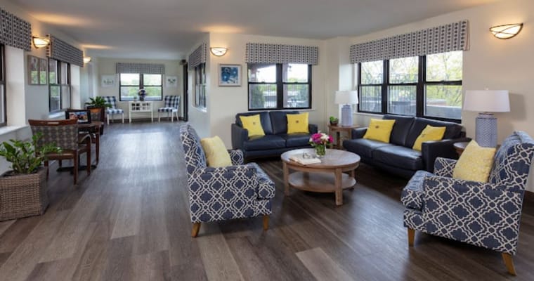 Spacious living room with comfortable seating and natural light