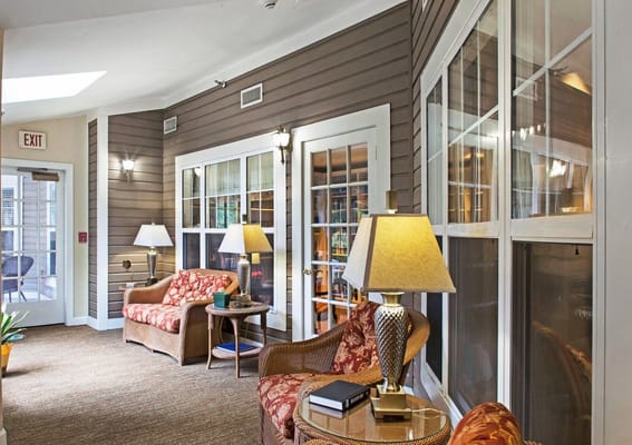 Lounge area with seating and lamps at Sunrise at Buckhead