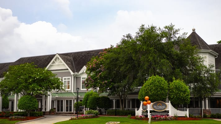 Exterior view of Sunrise at Siegen senior living facility.