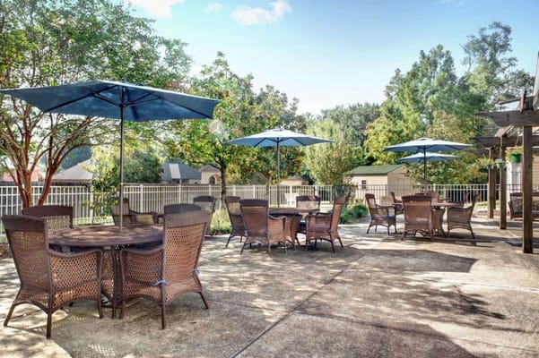 Outdoor seating area with umbrellas and tables