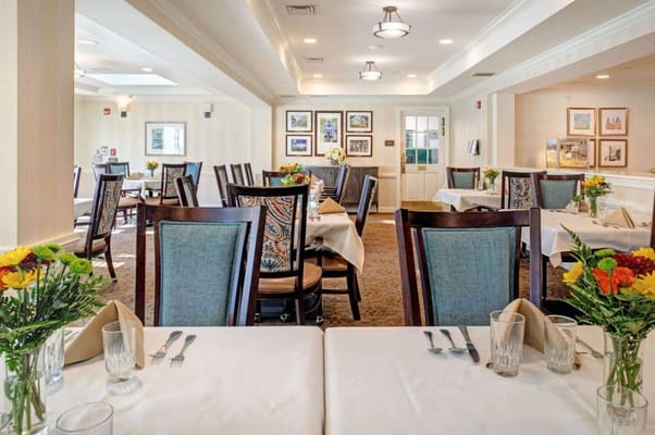 Bright dining area with tables set for meals
