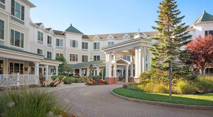 Exterior view of the facility entrance and garden