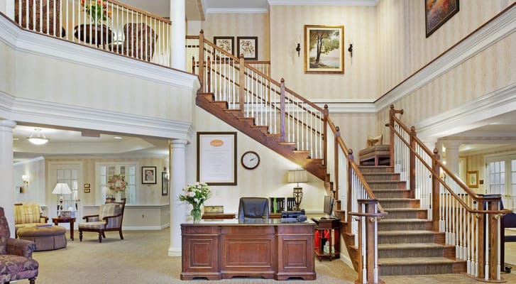 Interior lobby area with staircase and seating