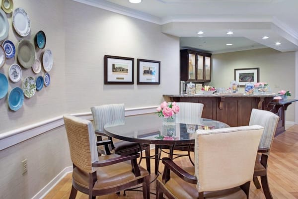 Bright common area with dining table and decorations