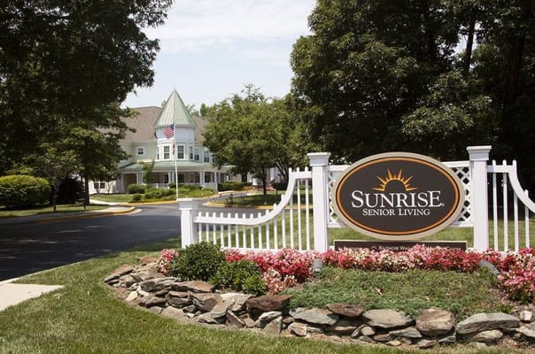 Exterior view of Sunrise Senior Living facility entrance