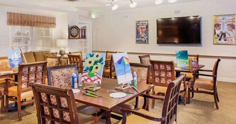 Activity room with art supplies set up for residents
