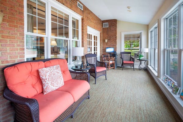 Interior common area with seating and natural light