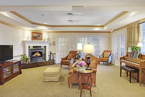 Cozy common area with seating and fireplace