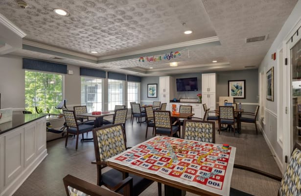Bright activity room with bingo game setup