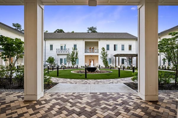 View of landscaped courtyard with pathways and seating