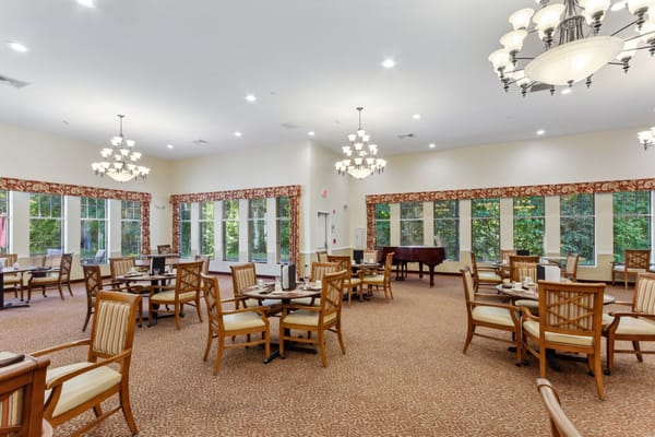 Bright dining room with tables and chairs