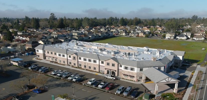 Aerial view of The Lodge at Piner Road and surrounding neighborhood