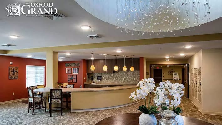 Elegant lobby area with seating and flowers