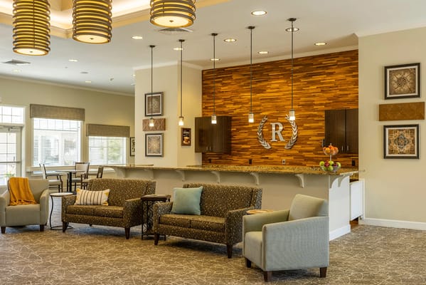 Bright and welcoming interior common area with seating