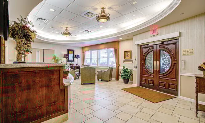 Cozy lobby area with reception desk and seating