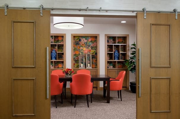 Bright common area with colorful decor and seating