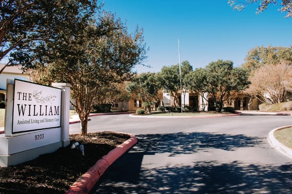 Main entrance sign of The William Assisted Living and Memory Care