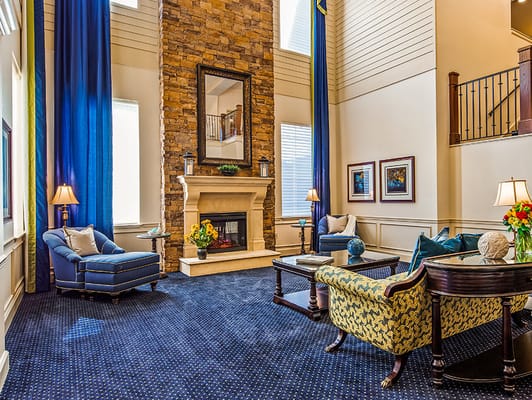 Cozy common area with comfortable seating and fireplace