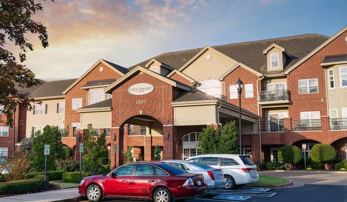 Exterior view of Touchmark building with cars