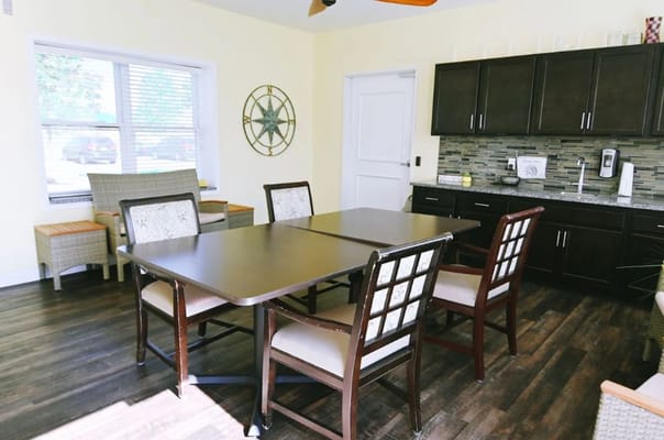 Bright multi-purpose room with tables and chairs