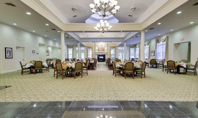 Dining room with tables and chairs set up