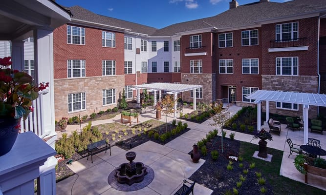 A landscaped courtyard with seating and walkways