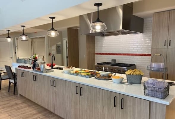 Modern kitchen with food display at Willow Creek West AFC
