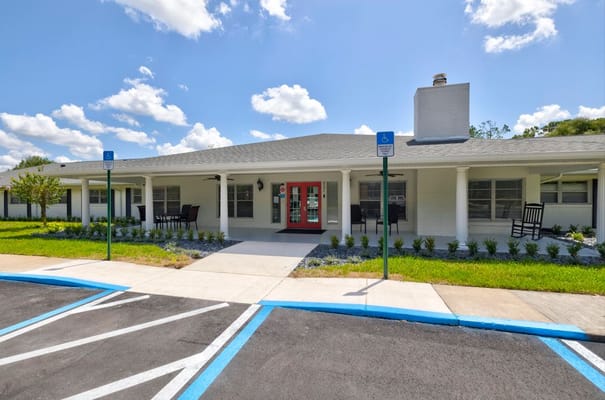 Front entrance of Eastbrooke Gardens with outdoor seating