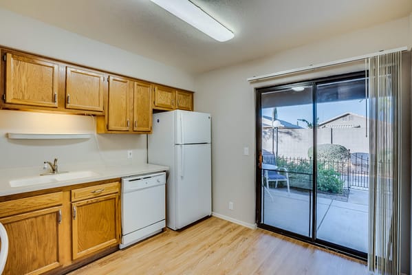 Bright kitchen area with access to outdoor space
